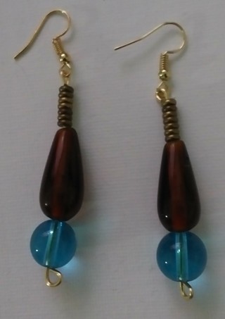 Pierced ear earrings. Gold and brass tone with glass beads. 2.75" long.