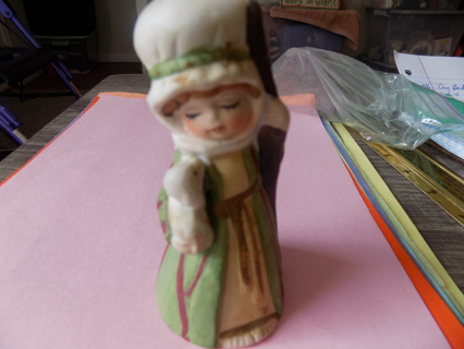 Vintage bisque porcelain shepherd bell wearing green gown has lamb