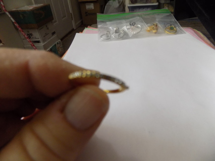 Ring # 7 goldtone thin band sz 7 covered in rhinestones