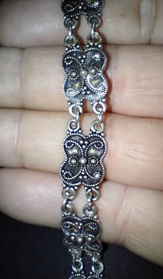 BRACELET ANTIQUE STERLING SILVER ORNATE 7.5 INCHES LONG HALF INCH WIDE 13.1 GRAMS 7 DAY SALE ONLY.