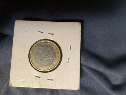 1 EURO COIN IN COIN HOLDER