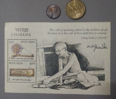 "Gandhi with Charkha [ spinning wheel ]"