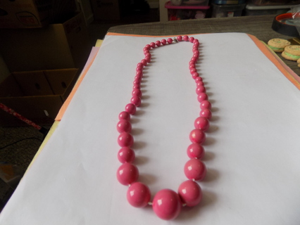 Necklace pink beads in graduating sizes