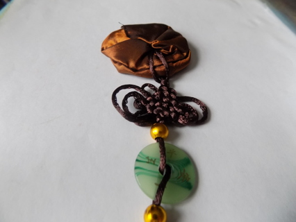 Chinese good luck charm ornament brown satin rosette at top woven designs Jade charm, tassel