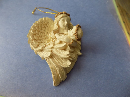 3 inch resin ornament Mother angel holding a baby angel in her arms