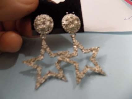 Earrings post 2 inch silvertone open star dangle covered in rhinestones attached to circle