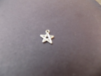 Silvertone  medium size hollow star charm