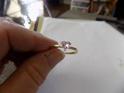 Goldtone thin band ring size 10 with pink heart shape stone