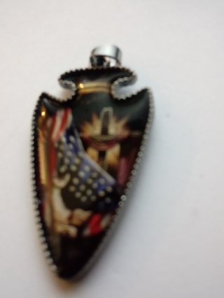 Arrow head with cross and American flag 