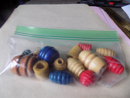 14 wood macrame beads different colors and shapes