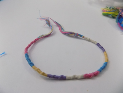 Hand made pastel shades thread Friendship bracelet pink blue yellow purple, white