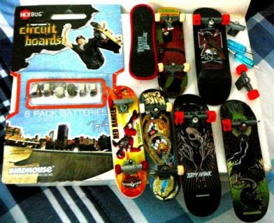 Seven finger skateboards & Pack of Circuit Boards Batteries some with wheels