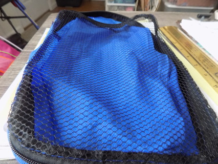 Blue oblong nylon netted mesh travel bag 10 x 7 zips all around