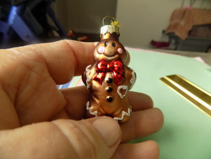 2 inch vintage look of glass gingerbread boy ornament with red bow