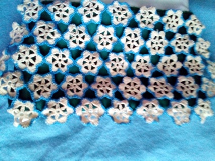 pretty blue.\white crochet doiley