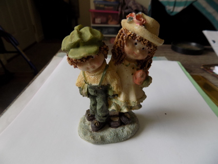 4 inch tall country girl and boy figurine boy in green overalls, girl yellow ruffle dress