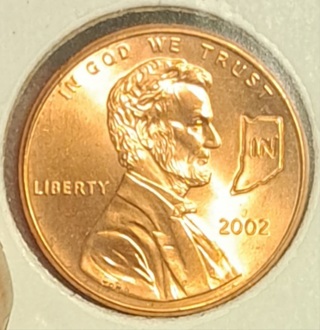 2002 Lincoln Cent counterstamped with outline of Indiana