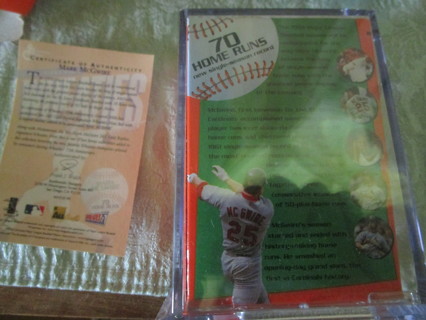 mark McGwire Wheaties box sealed in hard plastic container with a baseball card 