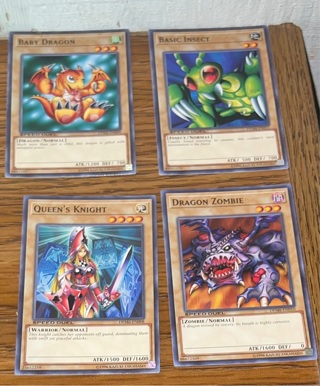 4 yugioh trading cards 