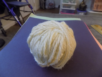 Ball of pale yellow yarn