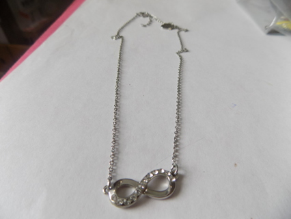 Time & True silvertone necklace with infinity symbol charm