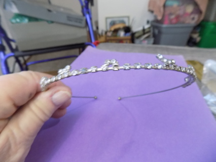 Thin silvertone rhinestone covered head band