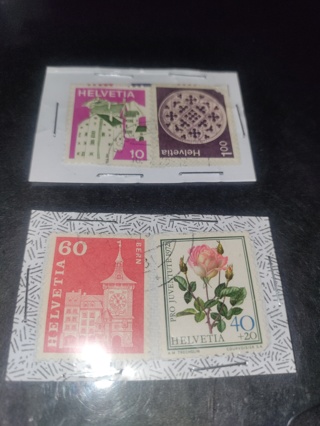 Four HELVETIA Stamps