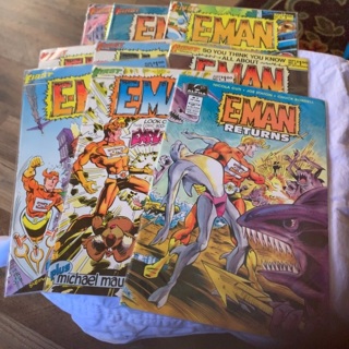 Lot of 9 E-MAN comic books 