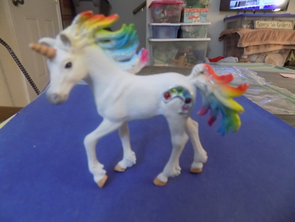 3 1/2 inch tall unicorn with rainbow mane & tail , rhinestone jewel on hip