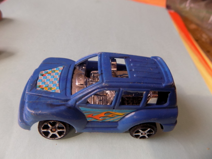 Dark blue plastic SUV toy car 2 1/2 inch flames on side, checkered hood