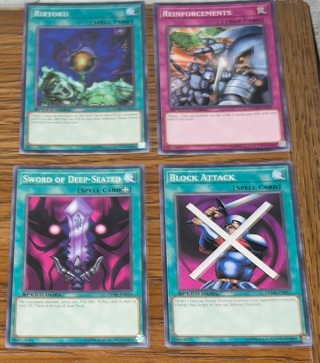 4 yugioh trading cards 