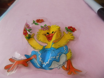 5 inch duckling in blue dress tossing flowers in air window/mirror cling