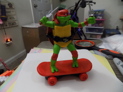 Teenage Mutant Ninja Turtles Sewer Shredder on red skateboard