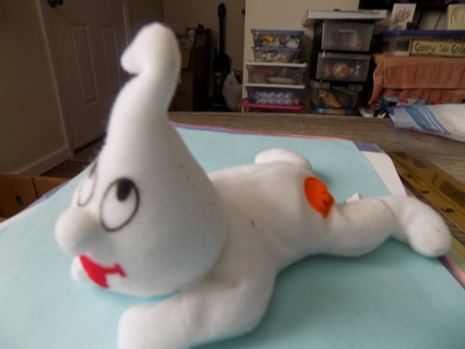 7 inch ghost plush in crawling pose & Jack'a-lantern patch on butt