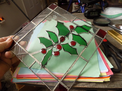 8 inch square hand made stained glass suncatcher with holly, leaves, berries