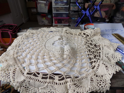 20 inch round tan crocheted table doily