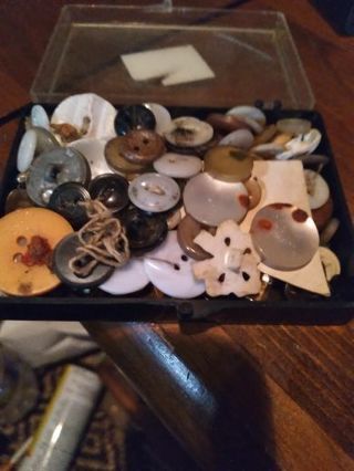 Container of buttons