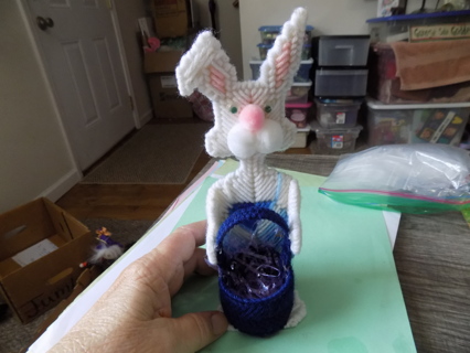 8 inch tall Needlepointed white rabbit holding dark blue basket