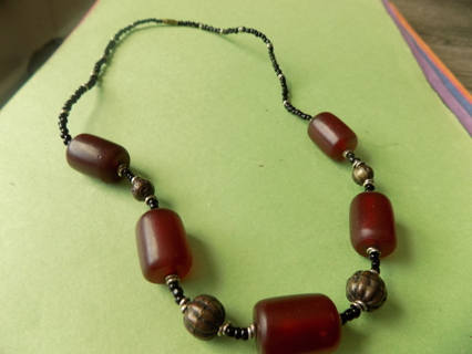 Vintage long tube root beer brown bead necklace on black E bead chain