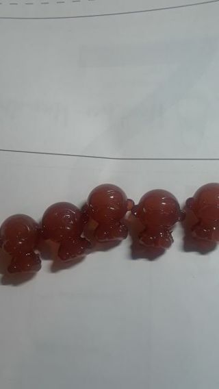 FIVE ACRYLIC BEADS MONKEYS