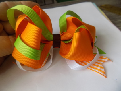 4 1/2 inch wide green orange, white ribbon bow barrette hand made