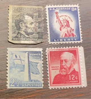 4 DIFFERENT AMERICAN STAMPS 