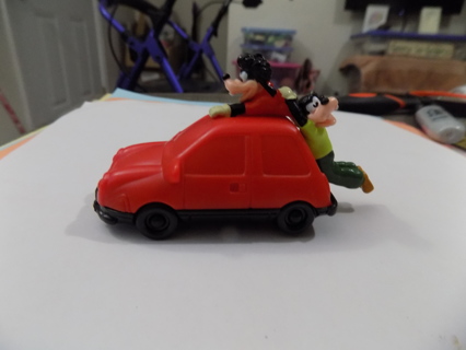 Vintage Burger King toy Goofy & son in red car