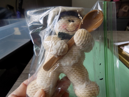 6 inch knitted gingerbread man ornament holds large wooden spoon