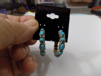 Earrings post 1 1/2 inch hoops covered in turquoise stones