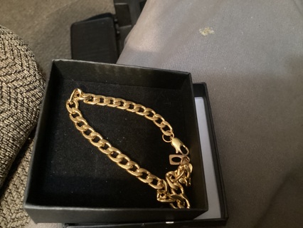 Golden bracelet in gift box