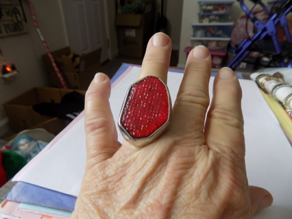 Adjustable cocktail ring oblong 2 inch tall red metallic stone in thick silvertone frame