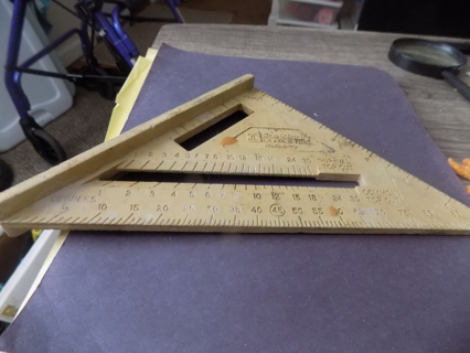 Johnson level and tool yellow triangle shape 10 x 7 x 7