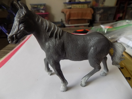 5 inch hard plastic smokey gray horse very well made