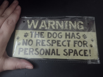 Sign: Dog Has No Respect for Personal Space